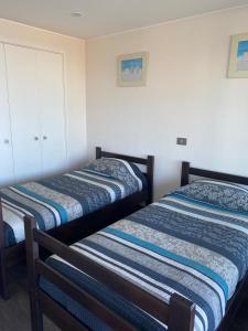 Letto o letti in una camera di Departamentos Mednav Montemar & Spa