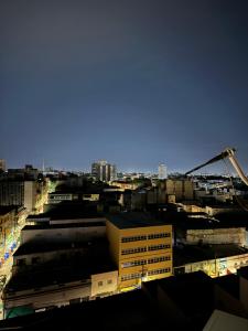 a view of a city with buildings and a crane at Apartamento Centro Manaus 921 in Manaus