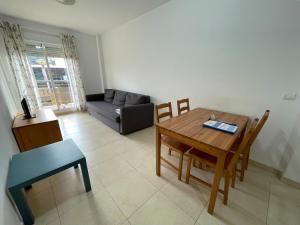 Posezení v ubytování Apartamentos Los Almendros 3000