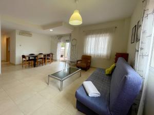 Posezení v ubytování Apartamentos Los Almendros 3000
