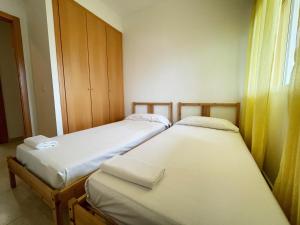 Postel nebo postele na pokoji v ubytování Apartamentos Los Almendros 3000