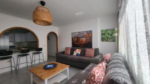 A seating area at Next to the beach 5 beds - Wifi by CanariasGetaway