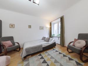 Posteľ alebo postele v izbe v ubytovaní Franciszkanska Blueberry Apartment