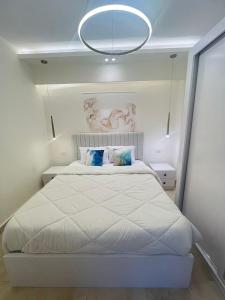 Ένα ή περισσότερα κρεβάτια σε δωμάτιο στο Property sisters, Elite apartment, Madinaty B12