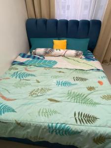 Postel nebo postele na pokoji v ubytování Casa Herminia at Bloom Residences 2Br