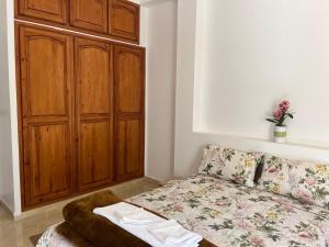 Katil atau katil-katil dalam bilik di Cozy appartement Tanger