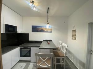 Köök või kööginurk majutusasutuses Apartman Aurora