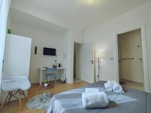 Postel nebo postele na pokoji v ubytování Alilè
