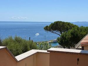 a view of the ocean from a building at Villetta con vista mare e parcheggio in Isola del Giglio