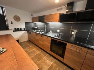 Kuchyňa alebo kuchynka v ubytovaní Maison T4 centre ville et plage