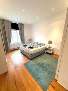 Katil atau katil-katil dalam bilik di Luxury Apartment In City