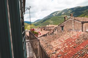 a view from a window of a town with roofs at Il Palazzo in Scanno