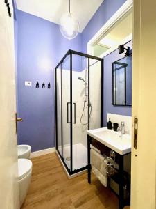 a bathroom with a shower and a sink and a toilet at Casa Flos31 in Catania +63 photos