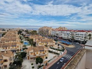 an aerial view of a city with buildings and a street at Scenic View Studio With Terrace in Torrevieja