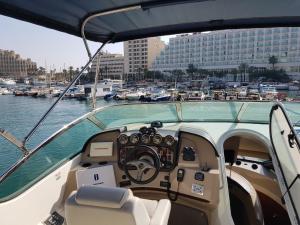 a view of the cockpit of a boat in a harbor at Top Luxury Exclusive Fully air conditioned 3bdr Yacht in Eilat