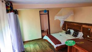 Ένα ή περισσότερα κρεβάτια σε δωμάτιο στο Wanale Falls Lodge