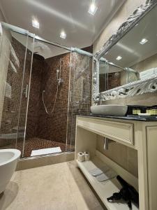 a bathroom with a shower and a sink at Domus Camillus in Milan