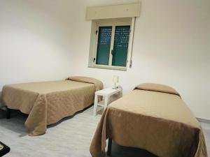 A bed or beds in a room at Villa Luce