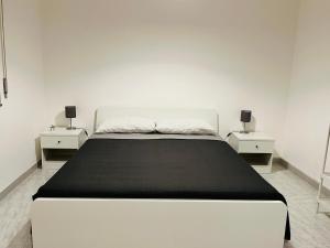 A bed or beds in a room at Villa Luce