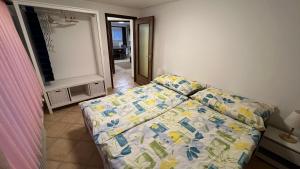 Postel nebo postele na pokoji v ubytování Ferienwohnung Casa Azalea