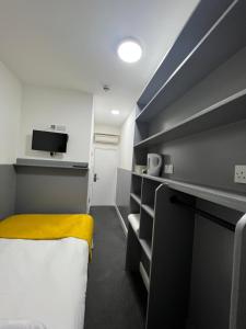 Postel nebo postele na pokoji v ubytování Plaza London Hotel