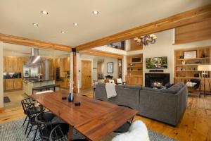 a living room with a couch and a table at All-Season Suncadia Home Hot Tub and Heated Patio in Cle Elum