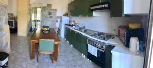 A kitchen or kitchenette at Villa Luce