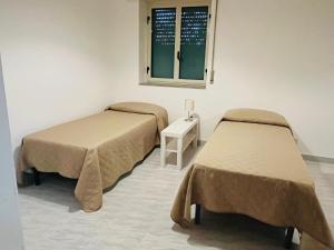 A bed or beds in a room at Villa Luce