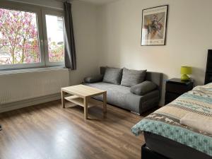 A seating area at near Düsseldorf Messe and Airport, two Bedrooms, Parking, Kitchen and Garden