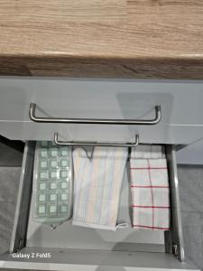 a close up of a sewing machine with a keyboard at By the Joyous Stays in Stoke on Trent