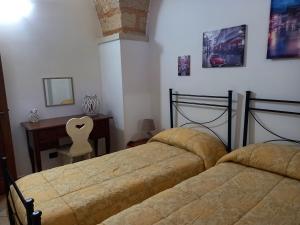A bed or beds in a room at Curti Russi