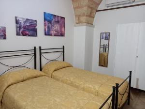 A bed or beds in a room at Curti Russi