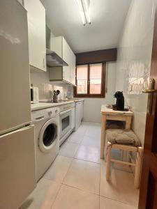 Kuchyň nebo kuchyňský kout v ubytování Apartamento en la costa