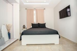 Postel nebo postele na pokoji v ubytování EcoMar Rentals + 37 fotografií