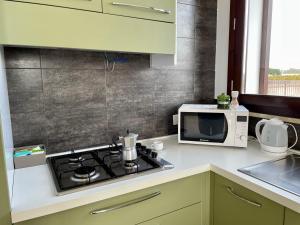A kitchen or kitchenette at Aquilone Garden