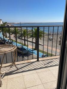 a balcony with a view of the beach at APARTAMENTO PRIMERA LINEA PLAYA in San Pedro del Pinatar