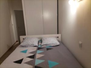 Säng eller sängar i ett rum på Entre Voyages et Occitanie