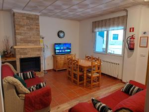 TV a/nebo společenská místnost v ubytování Apartamentos Martin