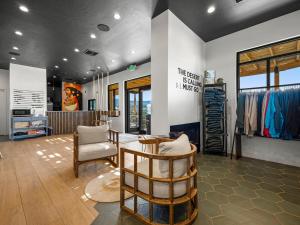 a room with chairs and a table in a store at Zion Wildflower Resort in Virgin