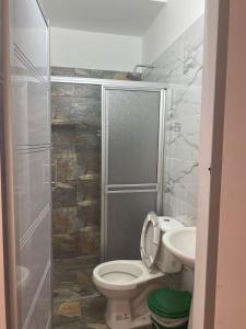 Ванна кімната в Apartamentos nuestro hogar Doradal
