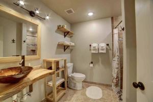a bathroom with a sink and a toilet and a shower at Angel Rock Rentals of Moab Unit 4 in Moab +12 photos