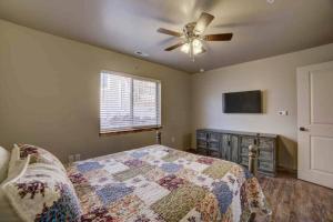 a bedroom with a bed and a ceiling fan at Angel Rock Rentals of Moab Unit 4 in Moab