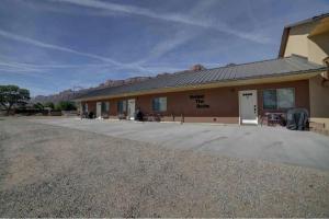 a building with a large driveway in front of it at Angel Rock Rentals of Moab Unit 4 in Moab