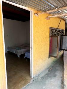 Hostal La Cabaña客房内的一张或多张床位