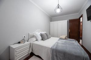 Postel nebo postele na pokoji v ubytování Apartamento acogedor centrico + 21 fotografií