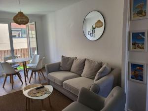Posezení v ubytování Joli T3 Cosy Netty proche Centre-Ville