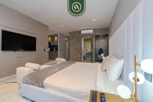 Katil atau katil-katil dalam bilik di Whole Building w Multiple Rooms for Rent