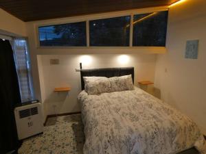 Ліжко або ліжка в номері Lilu Loft Turrialba