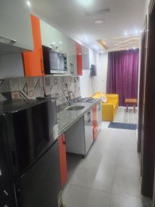 a kitchen with a sink and a counter top at بورتو مطروح الهاني in Marsa Matruh