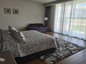 Postel nebo postele na pokoji v ubytování Viña del Cielo